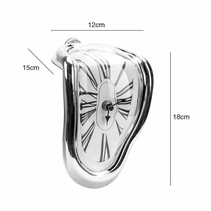 Dimension diagram of the melting clock showing 18 centimetres tall, 12 centimetres wide and 15 centimetres along the drape