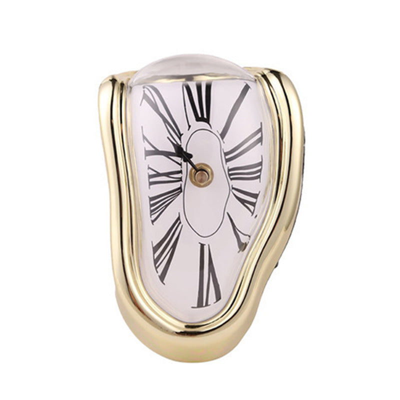 Gold melting clock, warm brass enamel rim with a white dial and printed Roman numerals